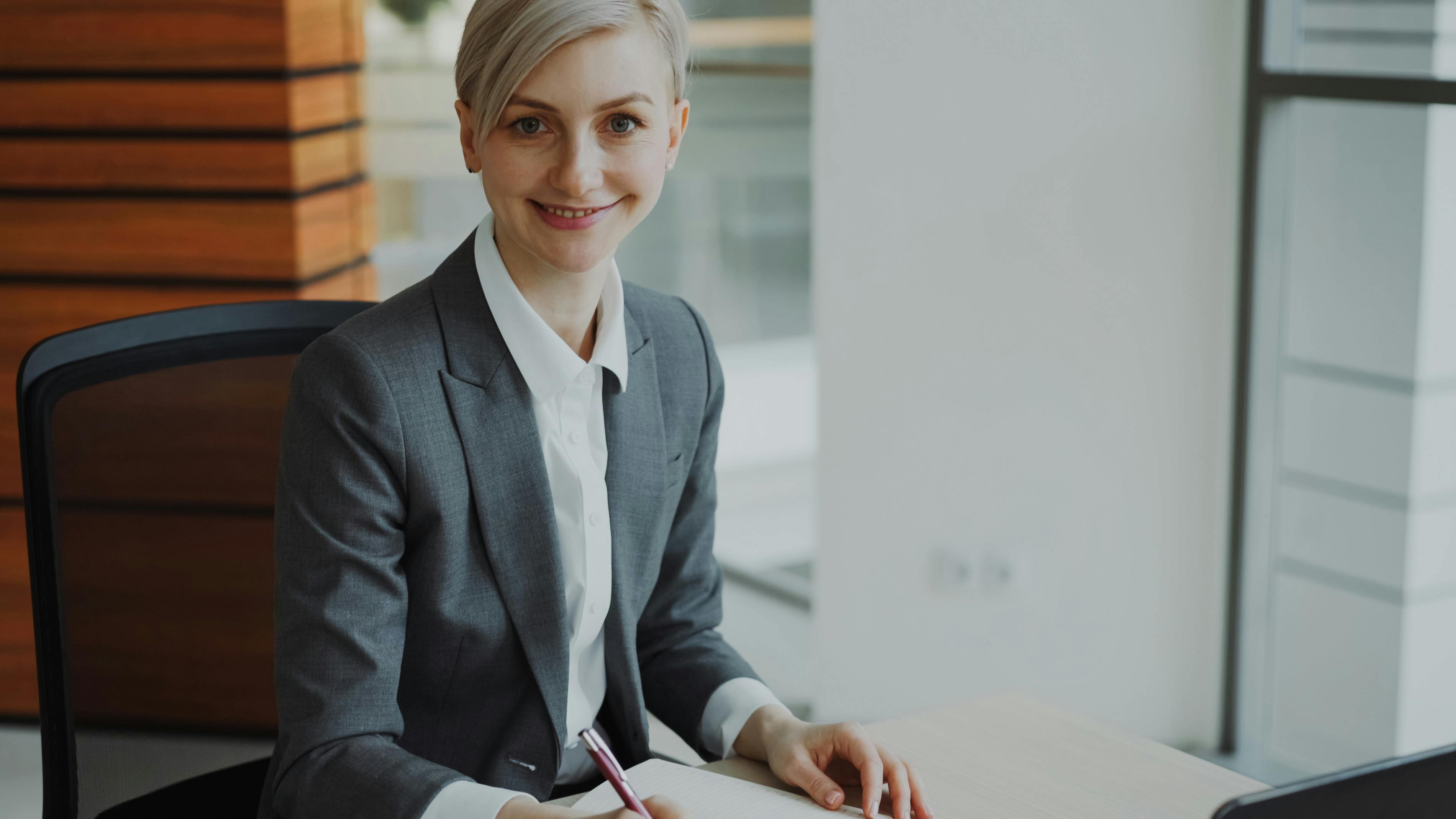 Businesswoman smiling at camera