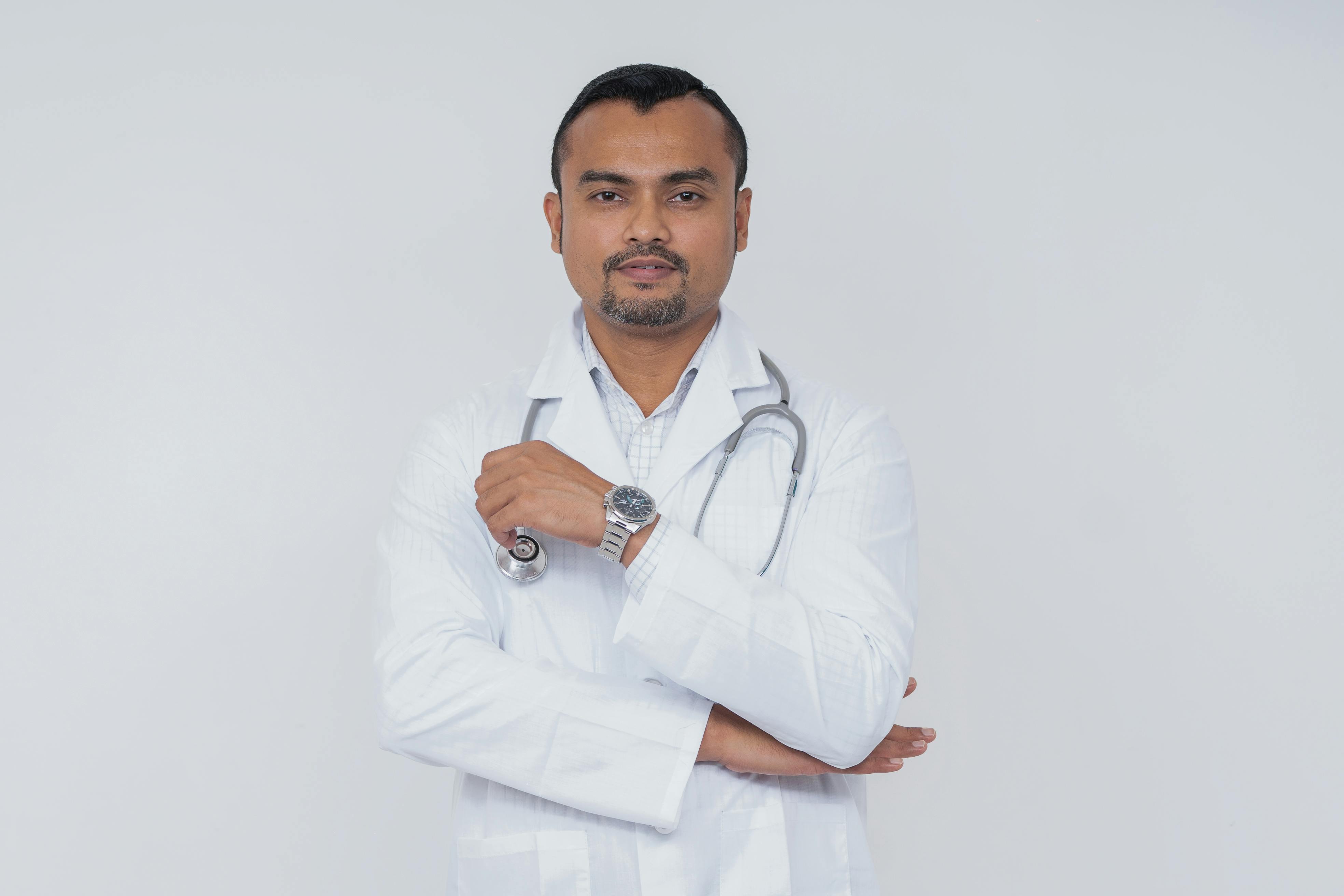Doctor wearing lab coat and stethoscope